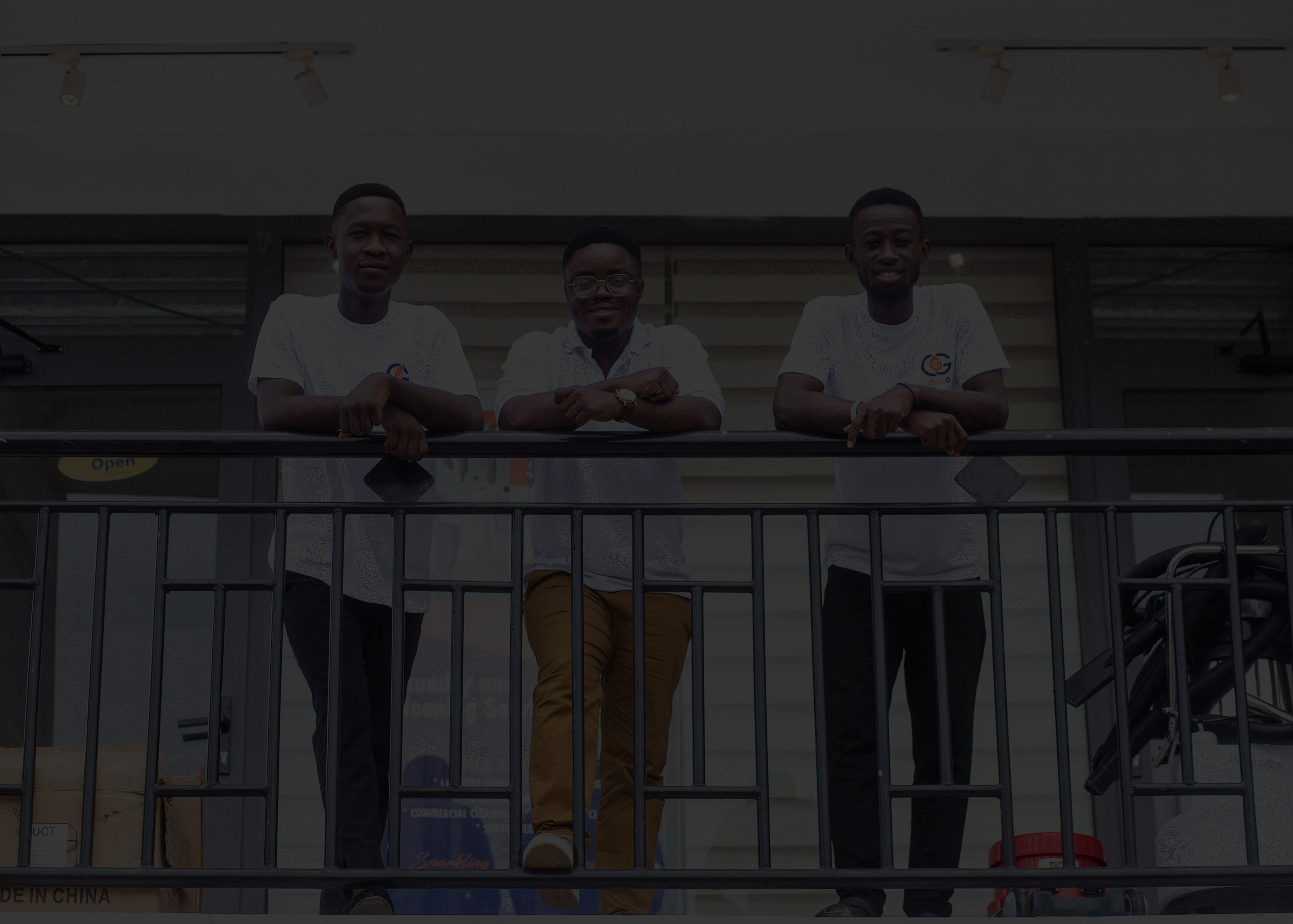 CG Dispo laundry and cleaning team in uniform outside office